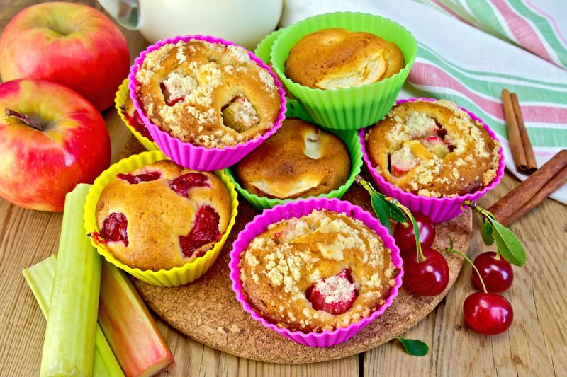 An image displaying bread, apple, muffin, and cupcake.