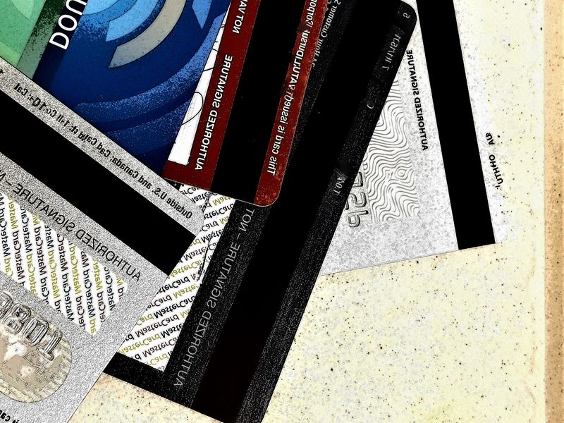 An image of a business card and a credit card.