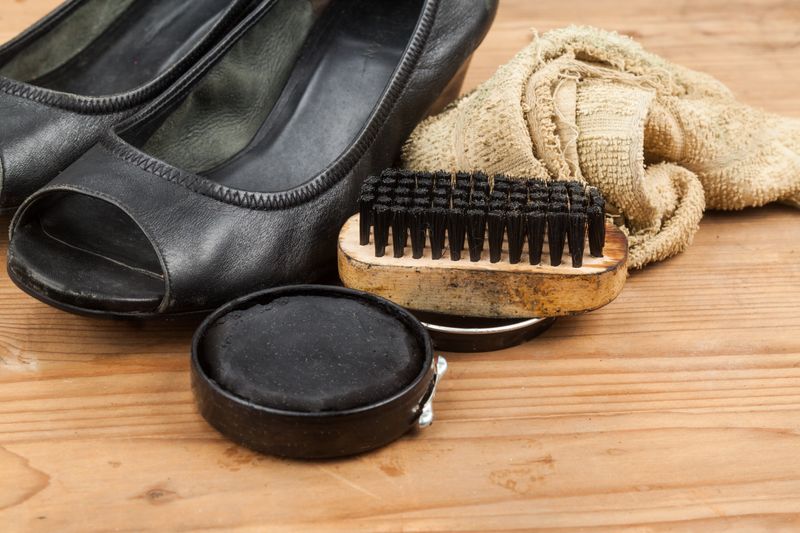 An image displaying a brush, device, tool, clothing, footwear, and shoe.