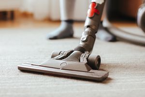 An image displaying a vacuum cleaner and a sock.